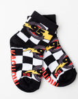 Pair of socks with checkered pattern and racing design on a white background