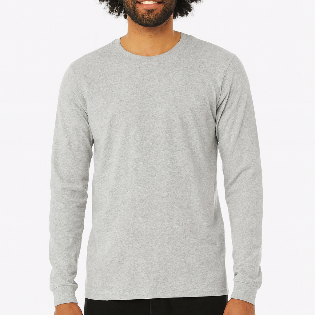 Male model wearing a heather gray Gildan G540 Heavy Cotton Long Sleeve T-Shirt on a white background — classic crew neck style ideal for custom printing by Lumiere Vive.