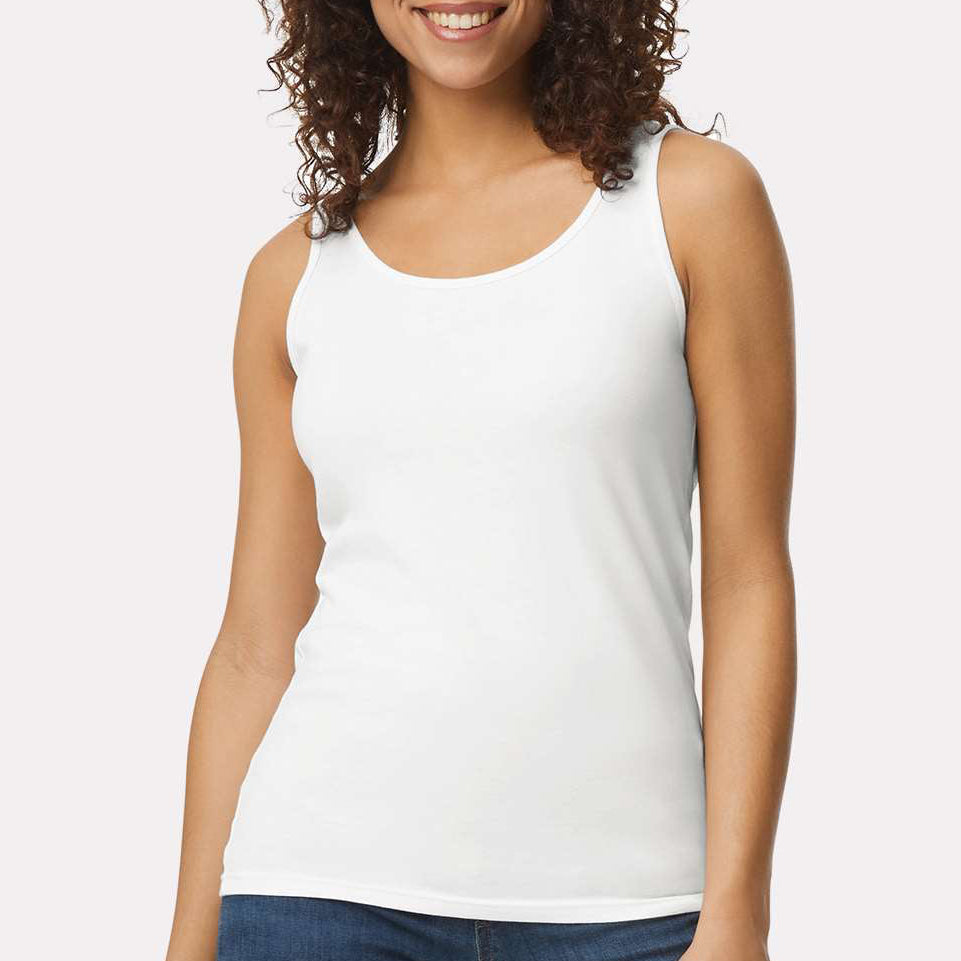 Female model wearing a white Gildan G642L Softstyle Fitted Tank on a light background — lightweight ringspun cotton tank ideal for custom printing by Lumiere Vive.