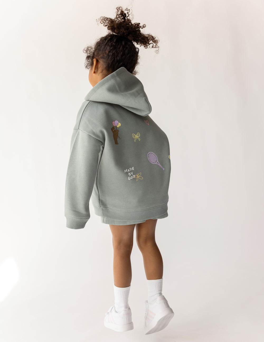 Child modeling the back of the Millstone Grey God Made Me Kids Hoodie