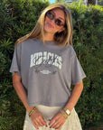 Grey Mist God of Miracles women’s cropped tee styled with jeans