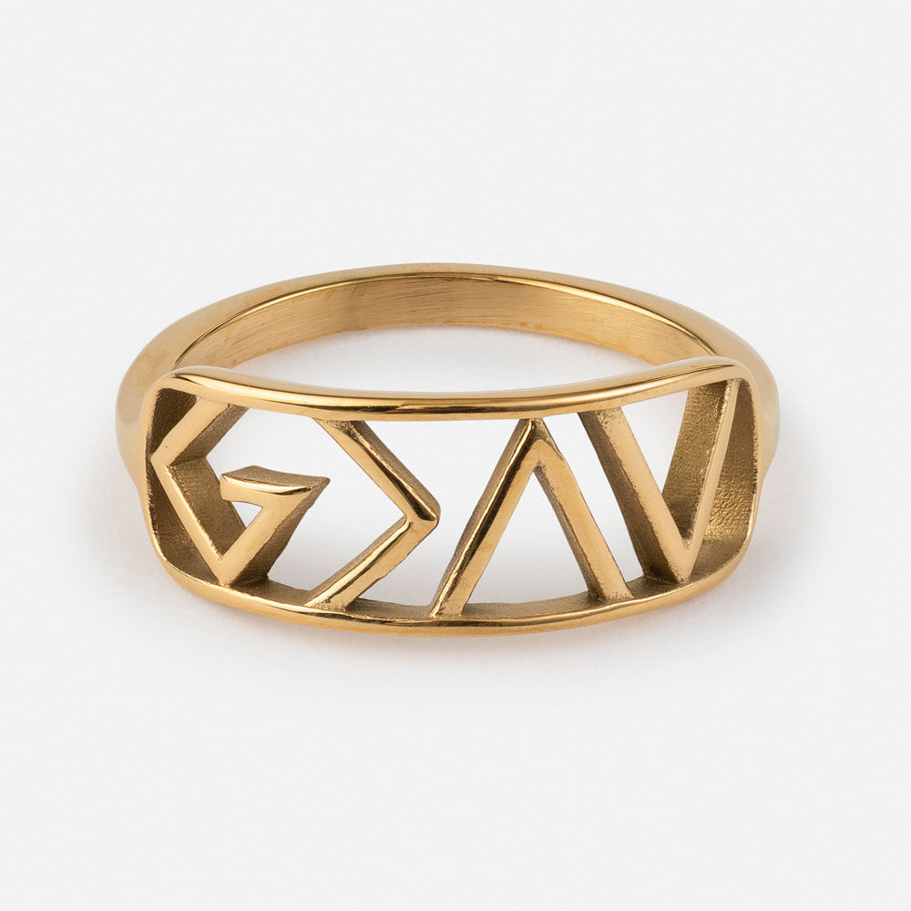 Gold geometric ring on a white background
