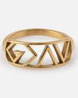 Gold geometric ring on a white background