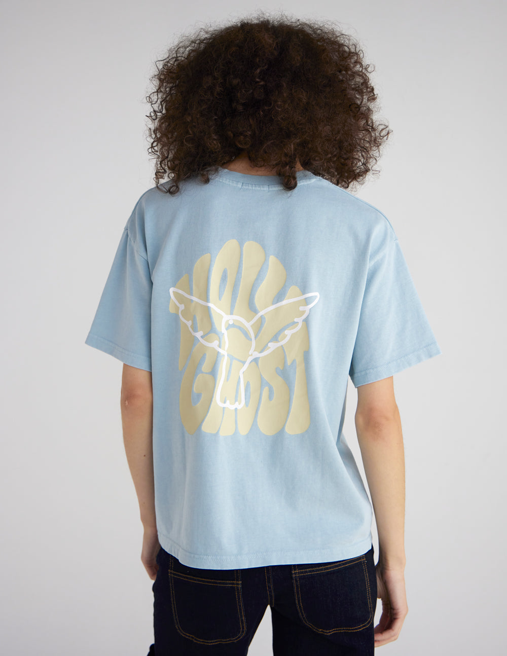 Back of the Sterling Blue heavyweight tee featuring a large yellow Holy Ghost graphic