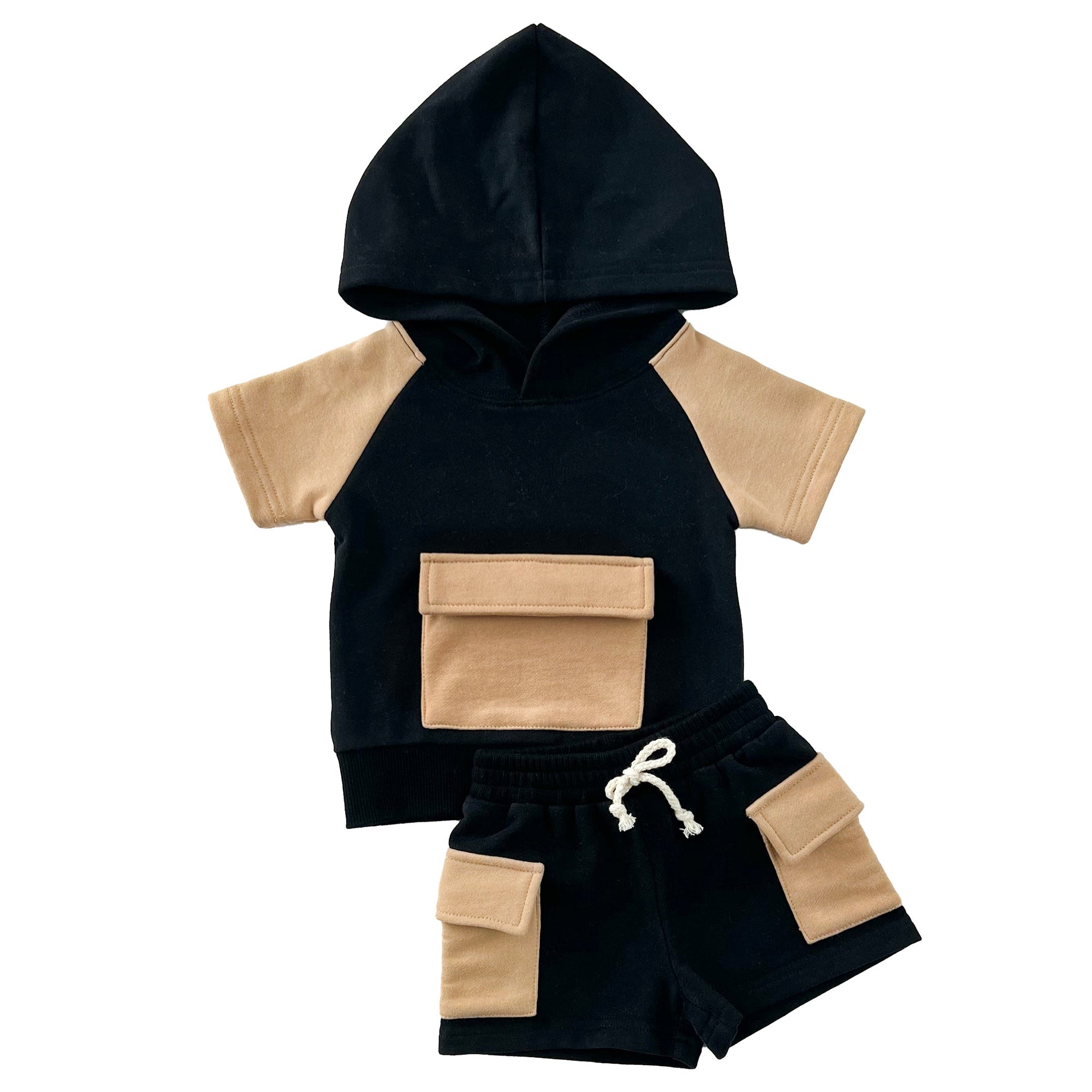Black and beige children's hoodie and shorts set on a white background
