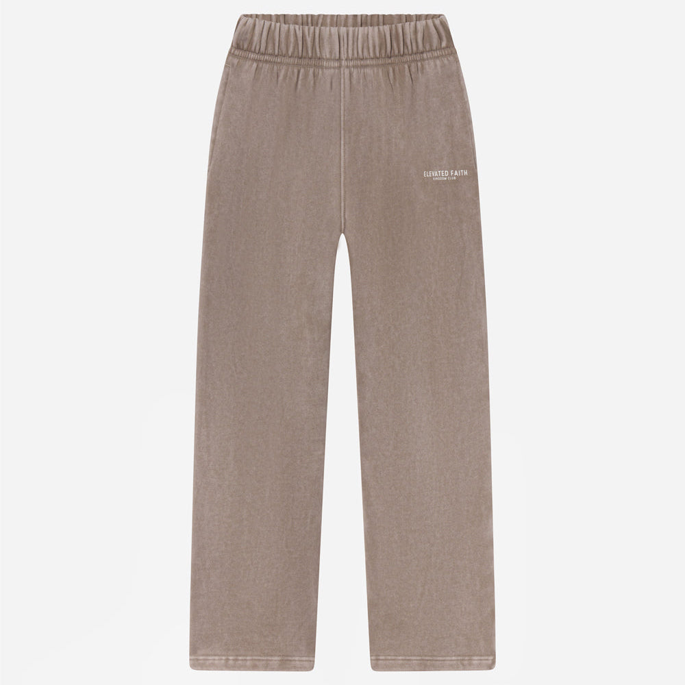Beige pants with a brand logo on a white background