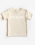 Beige t-shirt with 'Love Like Jesus' text on a white background