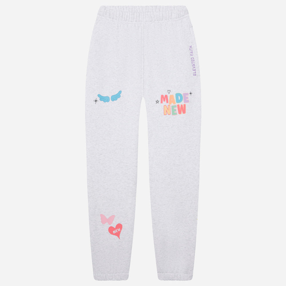 White sweatpants with colorful graphics and text on a white background