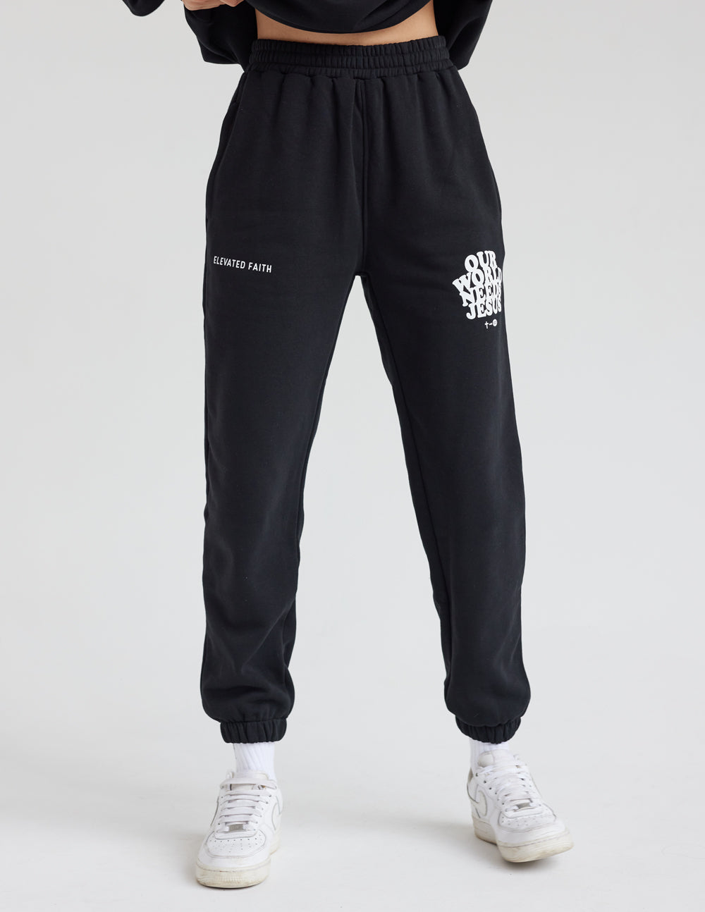 Our World Needs Jesus Black Unisex Sweatpants | Faith Based Premium Loungewear