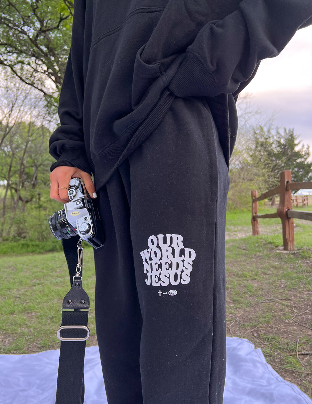 Our World Needs Jesus Black Unisex Sweatpants | Faith Based Premium Loungewear