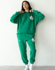 Our World Needs Jesus Green Sweatpants
