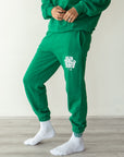Our World Needs Jesus Green Sweatpants