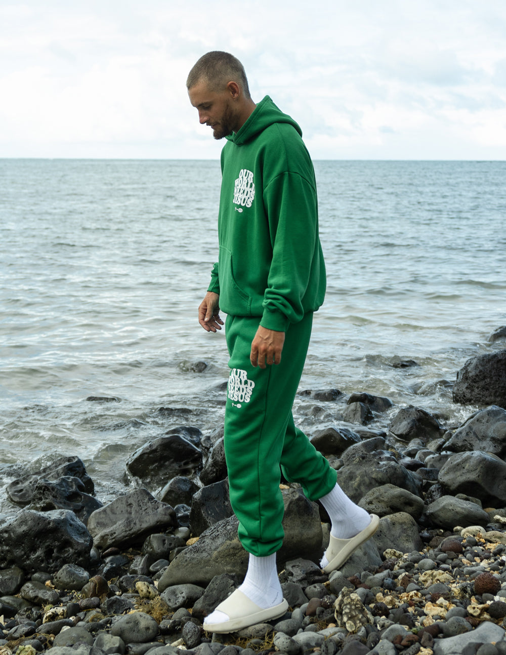 Our World Needs Jesus Green Unisex Sweatpants