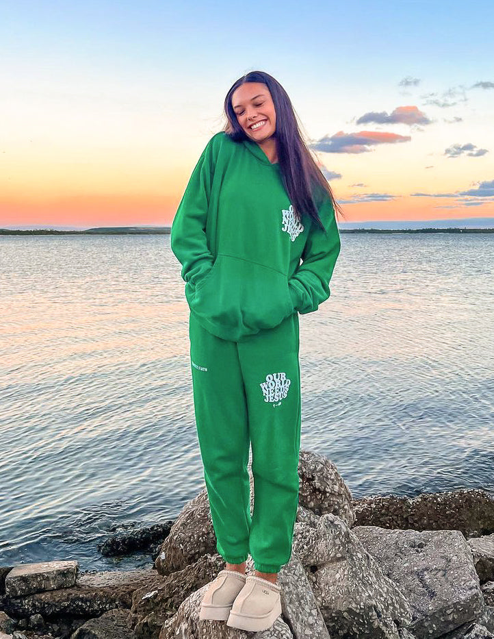 Our World Needs Jesus Green Sweatpants