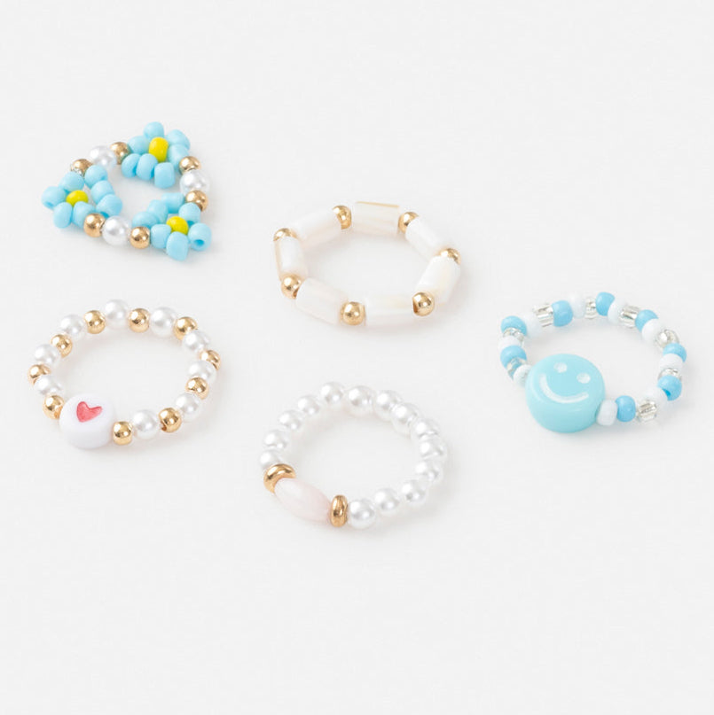 Set of five colorful bracelets on a white background