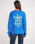 Back view of the blue Pray for Los Angeles tee showing white In LA as it is in Heaven lettering.