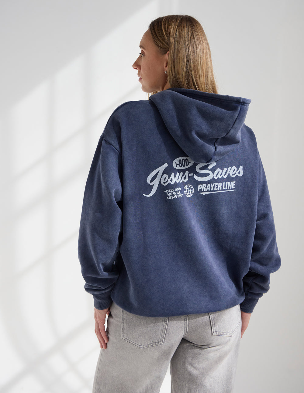 Back view of Deep Navy Jesus Saves Prayer Line hoodie