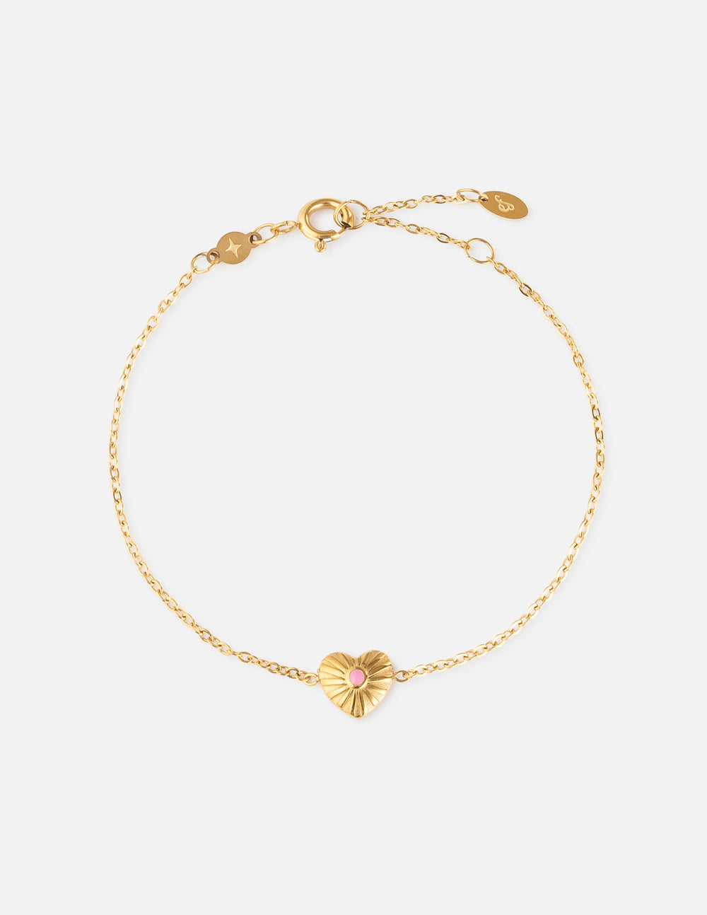 Pure in Heart Link Bracelet with gold-tone chain and textured heart charm with pink center