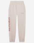 Beige sweatpants with 'STRENGTH' printed in red on a white background