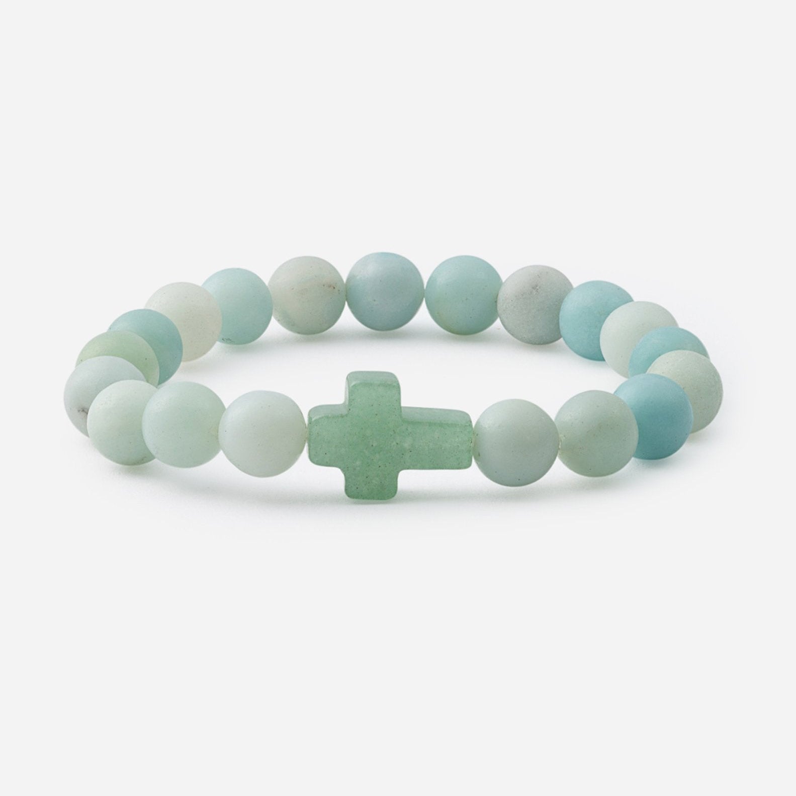 Beaded bracelet with a cross charm on a white background