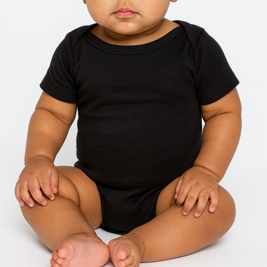 Infant wearing the BELLA + CANVAS 134B black triblend one piece, seated front view, ideal for custom printing