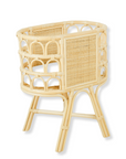 Wicker baby crib on a white background