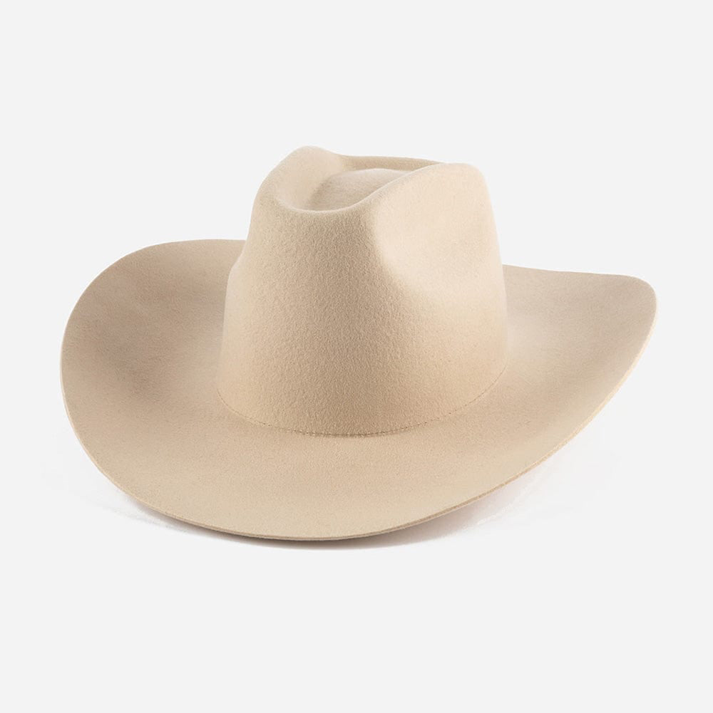 Beige cowboy hat on a white background