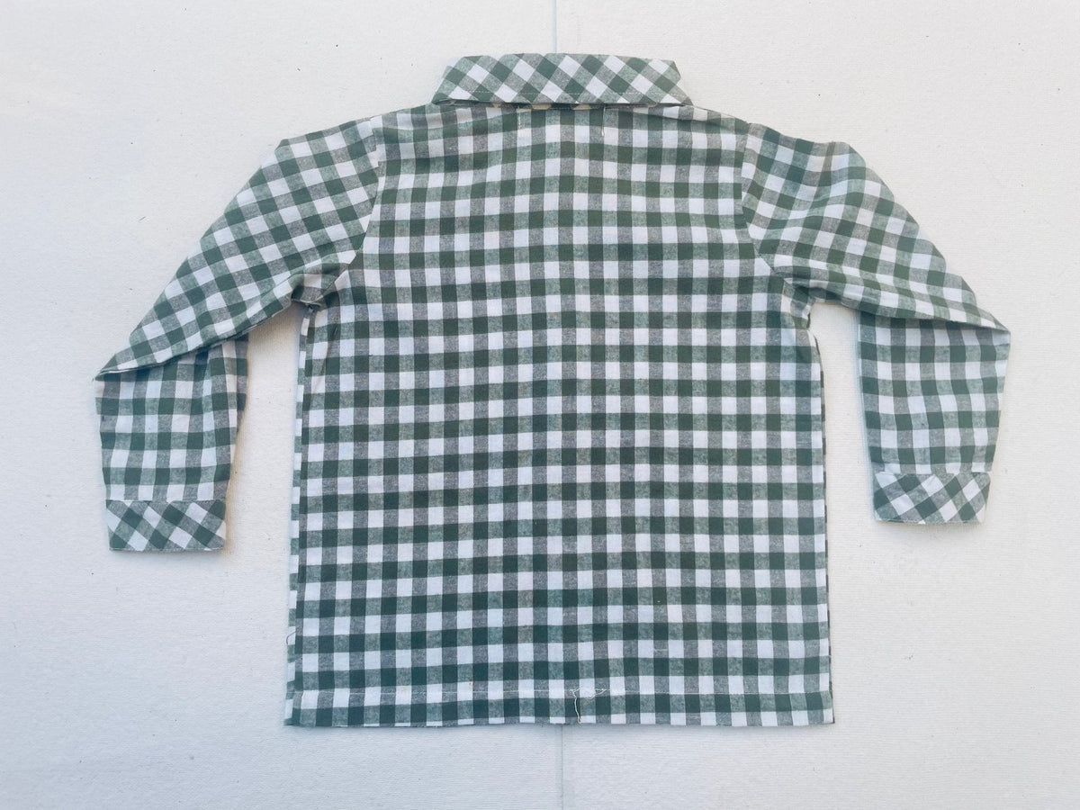 Back view of a boys’ green and white gingham collared shirt on a light background.