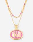 Gold necklace with a pink pendant on a white background
