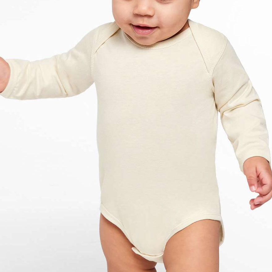 Infant wearing a natural Rabbit Skins 4421 fine jersey long sleeve bodysuit, front view, ideal for custom printing