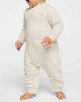 Infant wearing a natural heather Rabbit Skins 4447 fleece one piece, front view, ideal for custom printing