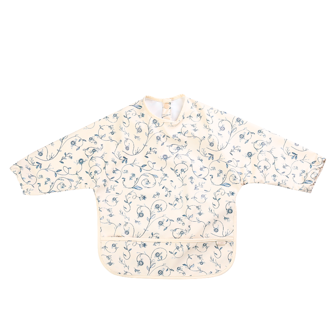 Floral-patterned baby bib on a white background