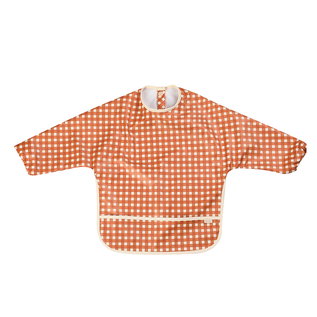Orange and white checkered bib on a white background