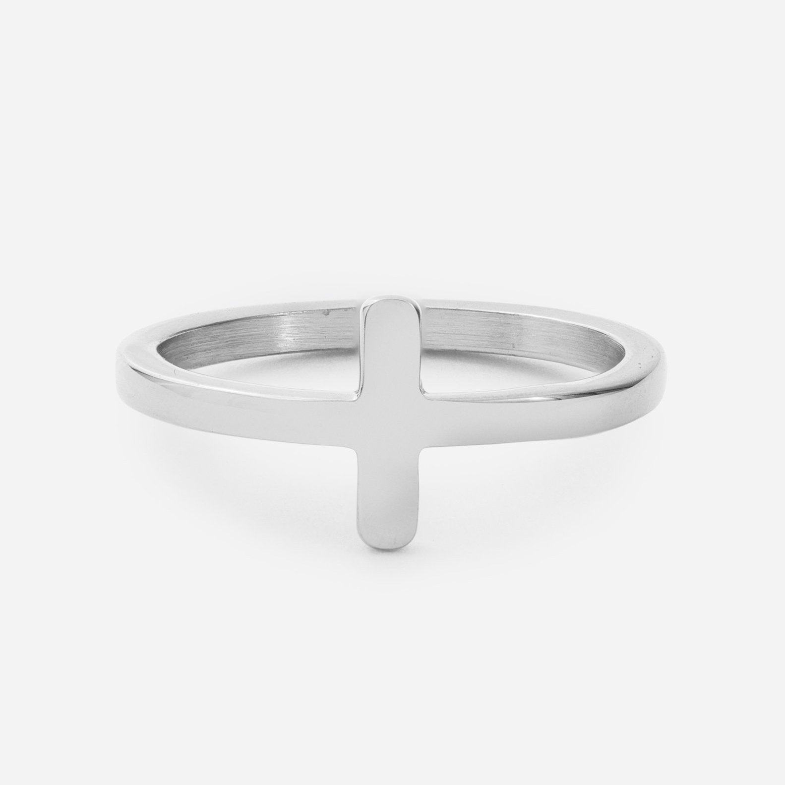 Silver ring with a central vertical bar on a white background