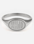 Silver ring with 'HHJD' engraving on a white background