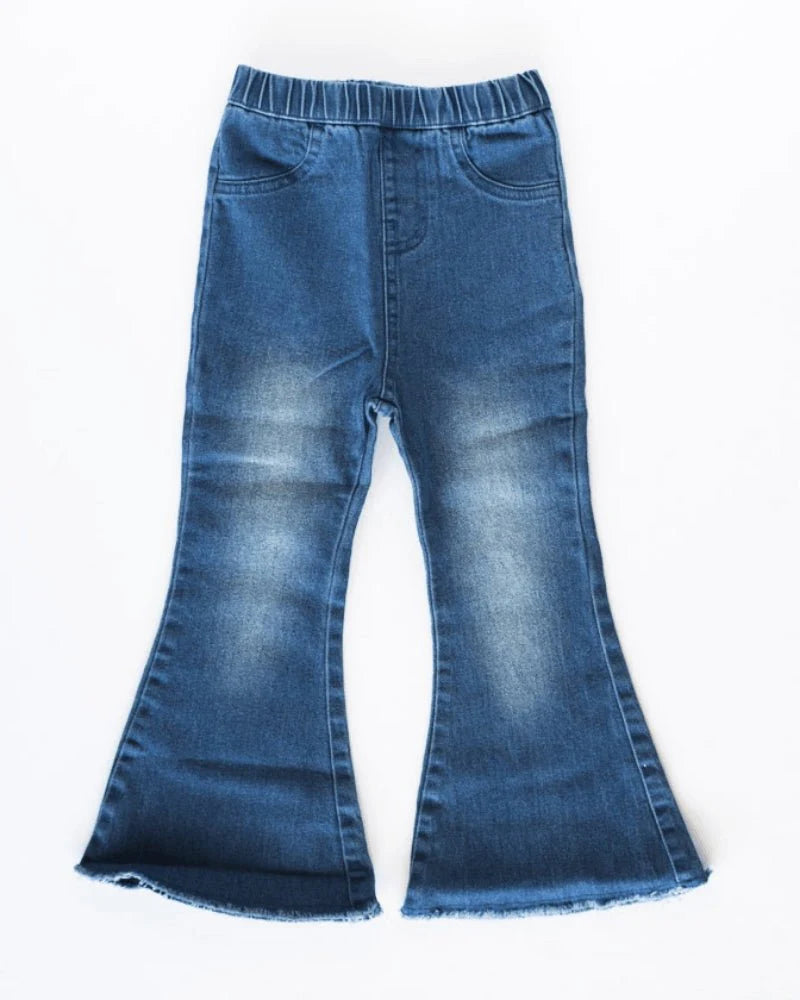 Blue denim bell-bottom pants on a white background