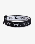 Black classic WWJD woven bracelet with contrasting white lettering and an adjustable closure